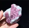 Piedra en bruto de cristal natural Donghai etiqueta mineral turmalina flor de ciruelo grava espécimen de enseñanza piedra de energía turmalina roja venta al por mayor de fábrica