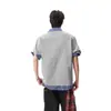 Camiseta de manga corta para hombre estilo americano de dos piezas falsas con cuello, nueva de verano 2026, estilo vintage universitario, top tipo polo