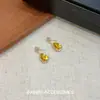 Brincos de Gota d'Água Amarelos com Temperamento de Luxo Leve Exquisitos de Nicho Estilosos Modernos Design Versátil Brincos de Gota d'Água de Alta Qualidade