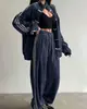 Nuevo Top Casual de Moda Amazon Primavera y Otoño con Tres Rayas y Detalle de Botones, Chaqueta Deportiva Vintage con Cuello Alto