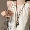 Nuevo Collar de Pluma de Bronce Antiguo Inspirado en el Zen de Estilo Chino para Mujer, Estilo Étnico Bohemio, Cadena Larga de Doble Capa para Suéter