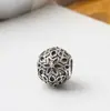 Huiyue nuevo retro DIY metal plata antigua con cuentas flor de seis pétalos pulsera redonda accesorios fábrica de cuentas al por mayor