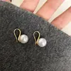 Pendientes de Perla de Circonita de Moda de Aguja Plateada Pendientes de Botón Retro de Lujo Ligero de Nicho Francés Pendientes Nuevos 2026