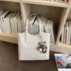 Bolsa de ombro casual e descontraída estilo coreano de grande capacidade, bolsa tote simples estilosa, nova para o verão de 2026, bolsa de ombro