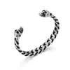 Pulsera de cuero tejido con calavera dominante para hombre, joyería de acero inoxidable, suministro al por mayor, moda europea y americana directa de fábrica