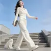 Conjunto de ropa de otoño para mujer transfronterizo: conjunto de dos piezas: un top de manga larga con capucha y cremallera y pantalones casuales de pierna ancha con cordón