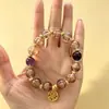 Pulsera de Cristal con Cuentas Doradas y de Jade Budista Multi-Tesoro Cultural y Creativa para Mujer Lujo Ligero Sensación de Alta Gama Atrae Riqueza y Suerte Diseño Estilo Chino