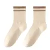 Calcetines de otoño e invierno hasta la pantorrilla con características absorbentes de sudor y resistentes al olor, calcetines casuales estilo universitario japonés, calcetines gruesos y cálidos a rayas para hombres y mujeres