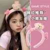 Diadema de pelo peludo diadema para lavarse la cara al por mayor para niñas diadema de borde ancho diadema de orejas de gato de celebridad de Internet lazo accesorios de pelo de felpa