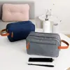 Bolsas de higiene pessoal e necessaires Yuanding estão em estoque, prontas para serem impressas em lotes de 50 ou mais. As bolsas de higiene pessoal catiônicas de segunda geração para homens e mulheres são adequadas para armazenamento em viagens.