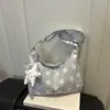 Otoño temprano 2026 nuevo bolso de hombro cruzado tote de gran capacidad para mujer, moda, para ir al trabajo, multiusos, moderno, venta al por mayor de bolsos para mujer
