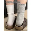 Meias vazadas de estilo japonês novas para a primavera para mulheres, meias até o meio da panturrilha com renda, tricotadas, modernas, que rejuvenescem, meias longas empilhadas
