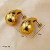 Pendientes de acero inoxidable de alta calidad con forma de gota de agua, súper vendidos en Europa y América, diseño nicho para mujer, pendientes huecos de oro de 18 quilates, venta al por mayor