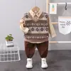 Ropa infantil estilo coreano primavera y otoño niños y niñas suéter chaleco para bebé camisa de manga larga con solapa traje de tres piezas para niños entrega