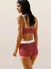 Bikini de dos piezas transfronterizo europeo y americano, estilo deportivo con parte inferior de corte recto, diseño de rayas de alta gama, adecuado para surf en la playa, con almohadillas en el pecho