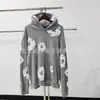Flor de Algodón Seleccionada Cuidadosamente Estilo Urbano Retro de Moda Sudadera Unisex con Capucha Estampado de Puff Holgada Versátil Sudadera Estampada