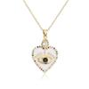 Collar con colgante de ojo de circón y gota de aceite de oro de 18 quilates chapado en cobre con cadena de clavícula de corazón hueco de temperamento de nicho transfronterizo de Aogu