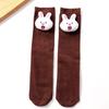 Nuevos calcetines altos para niños bordado de cabeza de muñeca cabeza de conejo lindo Joker color liso niños grandes calcetines altos fabricantes venta al por mayor