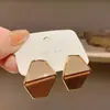 Pendientes de botón florales retro marrones franceses diseño de nicho pendientes geométricos nuevos de moda lujo ligero de alta calidad pendientes para mujer