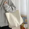 Bolso tote original de gran capacidad de color liso, bolso de lona para ir al trabajo para estudiantes universitarios, bolsa de compras, bolso de hombro simple y artístico para mujeres