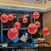 Decoração de balões para evento de loja em novo shopping em 2026, celebração de aniversário de inauguração, bolas suspensas no teto, configuração para transmissão ao vivo