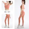 Novo conjunto de yoga estilo europeu e americano com costas em U para mulheres, apresentando um top esportivo de alças largas e absorção de choque e leggings de cintura alta e justas, um conjunto de ginástica de duas peças