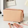 Nova Bolsa de Maquiagem Seersucker Quente de Vendas Transfronteiriças, Necessaire de Grande Capacidade, Bolsa de Armazenamento de Viagem Listrada, Clutch de Cor Sólida