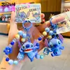 Colgante de Playmate Auténtico de la Serie Stitch Llavero de Dibujos Animados Muñeca Llavero Creativo de Bebé Interestelar Coche