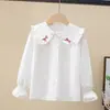 Camisa de menina Primavera e Outono nova camisa de algodão de manga comprida com gola de boneca para crianças médias e grandes camisa casual de moda para meninas