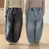 Pantalones Vaqueros para Niños Niños y Niñas Primavera y Otoño Casuales Pantalones Scimitar para Niños 2026 Nuevos Ropa de Otoño Pantalones Largos de Zanahoria para Bebé