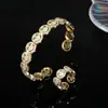 Pulsera Transfronteriza Aliexpress Cara Sonriente Retro para Mujer Diseño de Moda Ins Tendencia Elegante Pulsera Abierta de Cobre para Pareja Redonda