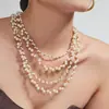Nuevo collar irregular hecho a mano estilo europeo y americano con perlas artificiales y cadena de acero inoxidable chapada en oro de 18k que no se decolora