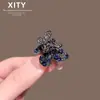 Nuevo y lujoso pasador de pelo de mariposa azul con incrustaciones de diamantes completos, pasador metálico para el flequillo de mujer de alta resistencia con adornos de diamantes, accesorio para el pelo de media coleta