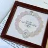 Pulsera de Cuarzo Rosa Natural Pulsera del Planeta Saturno Lujo Accesible Diseño de Pulsera de Encaje de Gama Alta Accesorios de Nicho para Mujeres