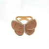 Pin de Clip para Bufanda de Camelia de Perlas Artificiales con Lazo Transfronterizo para Mujer, Clip de Esquina de Ropa de Alta Gama, Exquisito Accesorio de Broche de Nicho