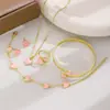 Conjunto de joyería de trébol de cinco hojas más vendido transfronterizo para mujer: un sencillo juego de collar, pulsera y pendientes de flor de la suerte en oro de goteo, una colección versátil de 5 piezas