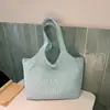 Bolsa de lona con bordado de letras estilo perezoso para mujer 2026 nueva elegante ligera bolsa de compras bolsa de mano para el trabajo
