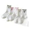 Calcetines sin costuras estilo primavera y otoño con borde de oreja de madera, puntos de dibujos animados, lazo de arena, calcetines largos, calcetines con estampado de animales lindos, venta al por mayor de Zhuji
