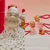 Puro oro 999 Labubu nuevo colgante de oro de la serie "Hazte Rico Rápido" con cordón, un artículo popular en las transmisiones en vivo de Douyin