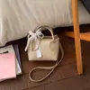 Bolso Cruzado Coreano de Nicho para Mujer con Lazo y Asa de Perlas, Bolso de Hombro Tipo Cubo Casual Simple a la Moda