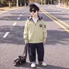 Chaqueta para Niños Ropa de Otoño 2026 Nuevo Estilo Coreano Moderna Chaqueta con Capucha a Cuadros para Niño Pequeño Ropa de Otoño para Niños