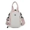 Bolso bandolera de nailon estilo coreano, fresco y versátil, para botella de agua, resistente al agua, moderno, ligero, bolso de hombro portátil, unisex