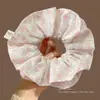Novo scrunchie de alta qualidade para rabo de cavalo baixo 2026 para mulheres, apresentando um estilo inspirado em Melard, um acessório de cabelo retrô para outono e inverno