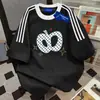 Camiseta popular de manga corta con tres rayas, 100% algodón puro, para hombre y mujer, nuevo estilo de verano, holgada, lujo ligero, adelgazante, top casual