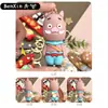 Llavero colgante de monstruo pequeño de la Montaña Langlang de dibujos animados chinos, alto valor estético, linda decoración de figura de resina, pequeño regalo