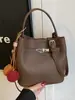 Bolso Cubo Versátil de Nicho Súper Popular Estilo Coreano 2026 Nuevo Bolso de Hombro Cruzado de Moda Casual para el Trabajo