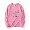 Estilo Novo Primavera e Outono Estampa Divertida de Desenho Camisetas de Manga Longa para Mulheres, Roupas Casuais para Usar por Cima, Tops Fofos e Versáteis, Camisetas