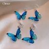 Brincos de Borboleta Manchadados em Resina Azul Atmosférica, Toque de Luxo Leve e de Alta Qualidade, Brincos Únicos, Brincos da Moda em Estilo Nicho