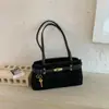 Bolsa de ombro feminina de grande capacidade, estilosa e moderna, com um design único, perfeita para o trabalho e para o dia a dia.; uma bolsa de ombro chique e casual