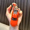 Chaveiro pingente de carro esportivo Huili pingente para bolsa de carro modelo chaveiro liga metálica brinquedo pequeno presente pequeno atacado